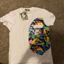 RARE Side Bape Head Multi Camo Rainbow Baby Milo whiteTee T Shirt Sz Medium. FITS SMALL! The t shirt fits more like a size small. Only other pic I cou