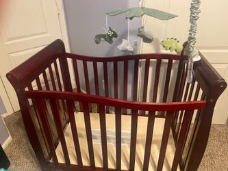 Wooden crib and mobile