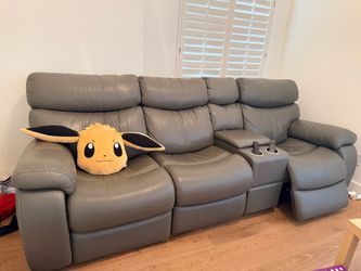Gray Leather Reclining Sofa with Console