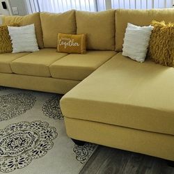 Like new! LIVING SPACES large yellow sectional sofa, 2 pieces 124" x 68" excellent sleeping area! All covers are removable for washing. Delivery avail