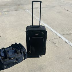 Suitcase From Travelers Club With Handling Wheels In A Duffel Bag From American Uni Both Used But In A Very Good Condition Probably Used Twice 