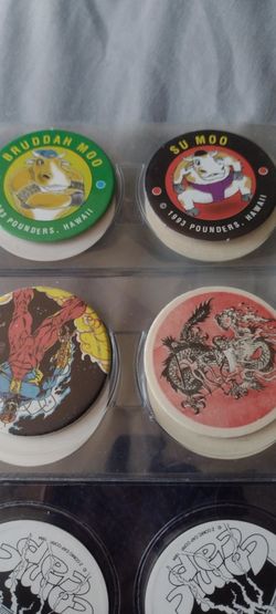 Pogs/Quantity 20 different pogs  includes superman Seahawks Bad Boy club pogs to name a few.  Cash porch pickup Redmond
