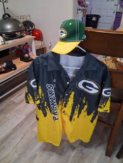 Green packers button up shirt and cap 20.00