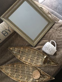 Mirror, sconces and mug