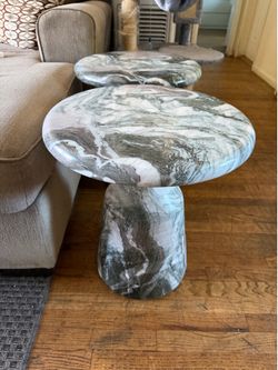 Marble top end tables.