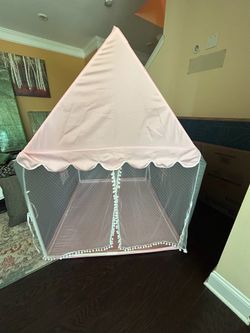 Pink and grey children’s play tent with star lights for $24
