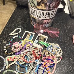 TAYLOR SWIFT eras tour movie bin + lots of friendship bracelets, two polaroids and heart shaped glasses 