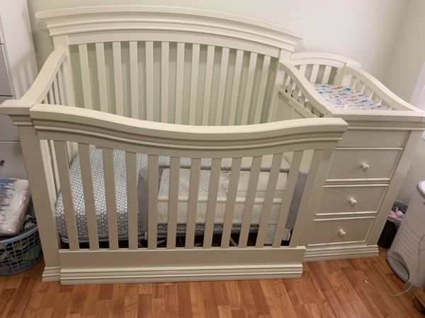 Solid wood Crib with changing table, mattress, and toddler railing for