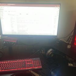 gaming pc two monitors a keyboard and mouse as well