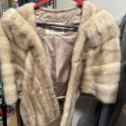 Multiple Vintage Coats And Shawls