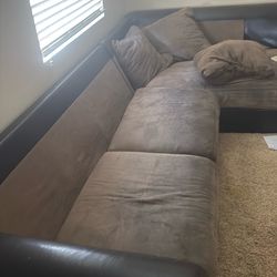 Sectional brown sofa with six pillows no pets no smoking
