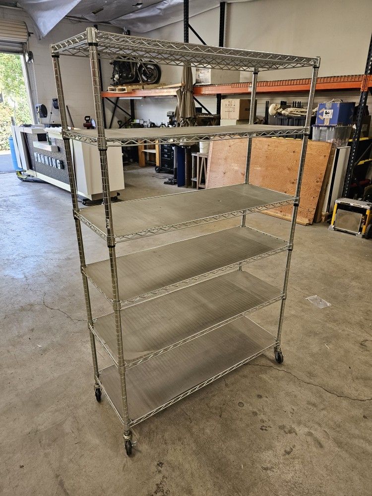 Rolling metal rack with 6 adjustable shelves and shelf liners

$150 FIRM

LAST ONE 