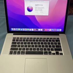(#36) Apple MacBook Pro 2.2  “Core i7” 15" Mid-2015  16 RAM, 250  GB Flash