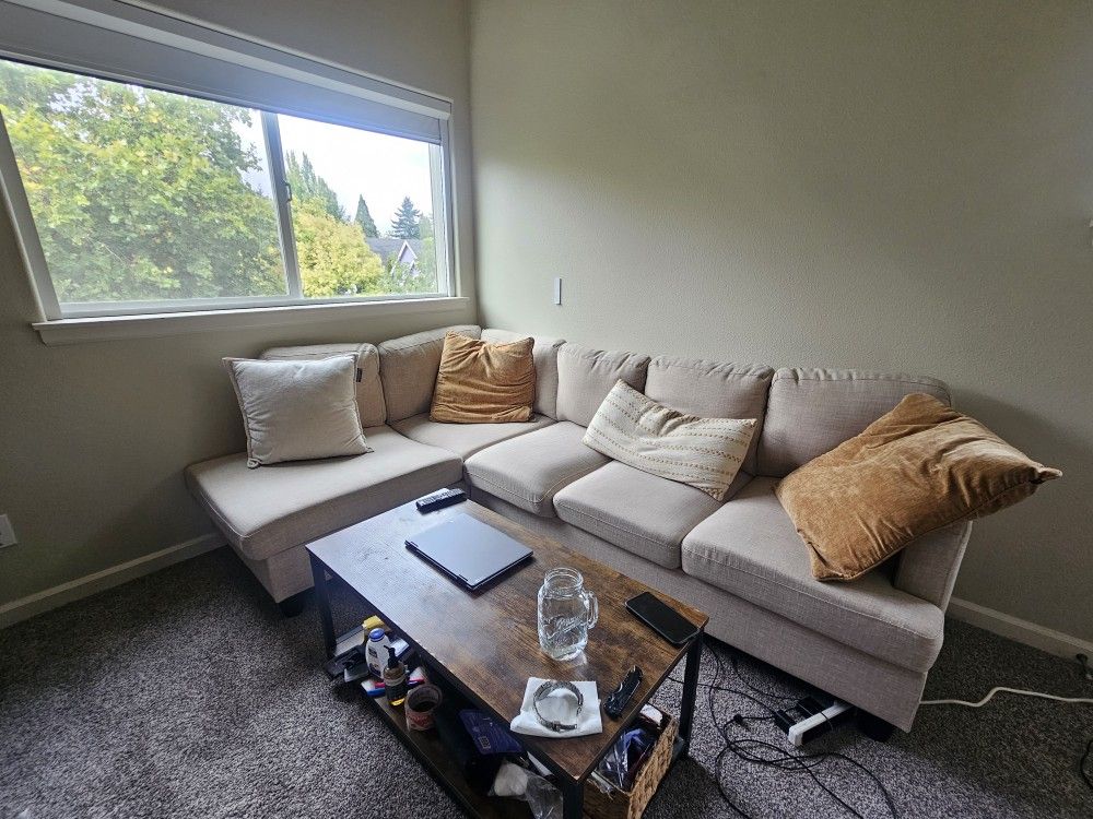 Large Beige Sofa + Faux Wood Coffee Table