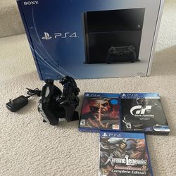PS4 With Wireless Remotes and Games
