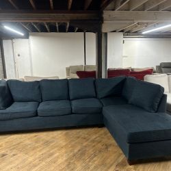 Delivery available blue sectional couch