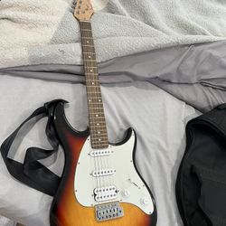 Electric Guitar With Case 