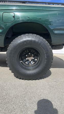 Black wheels 17in 12 wide 33in 12 wide BFG Goodrich mud grap tiers 90% tread.