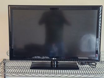 42" LG flat-screen TV, with base stand, in good condition w remote Great for a spare bedroom.