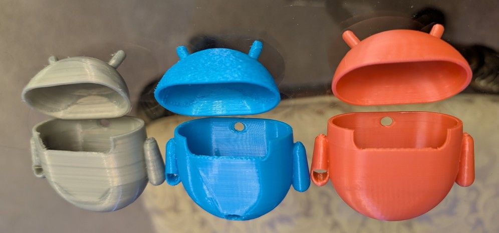 Black Spigen Rugged Armor Case and 3D Printed Cases for Pixel Buds Pro 1/2