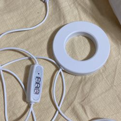 Luz para tomar fotos, tiene timer?