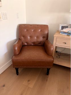 Faux leather arm chair