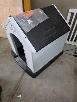 Medium Dog House with new vinyl door flap.