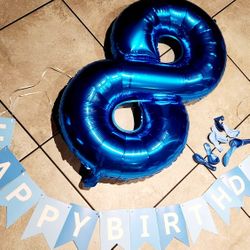 Blue birthday balloons & banner