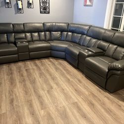 New Reclining Sectional.  Grey Or Ink Blue Gel Leatherette.  123” X 123”.  Free Delivery!