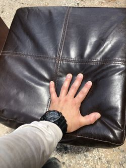 Comfy leather chair with storage room.