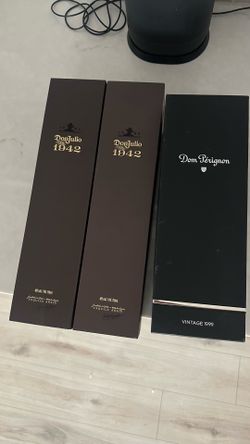 Empty Don Julio 1942 and Dom Perignon Boxes