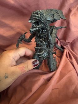Alien queen figure