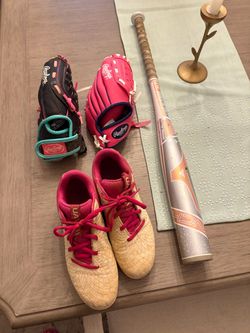 Softball gloves, softball bat and cleats