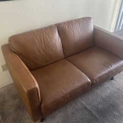Tan/Brown Leather Loveseat