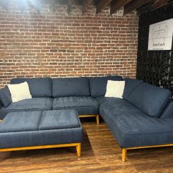 Delivery Available Maceys blue 2pc sectional with storage ottoman