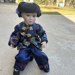 Porcelain Doll With Seat