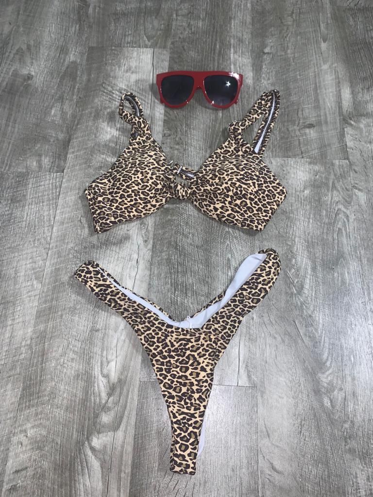 Bikini swimwear set with a pair of sun glasses