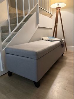 Gray bench with storage