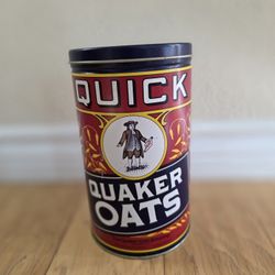 Antique Quaker Oats Tin. ( 9 Inches Tall ).