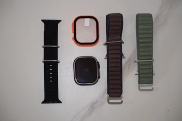 Apple Watch Ultra 2 Black Titanium w/ multiple bands + watch case