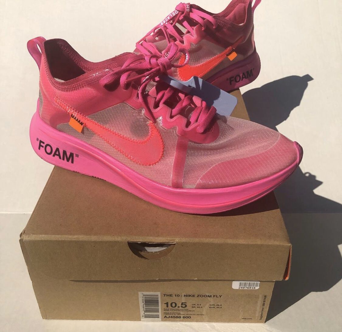 Pink Zoom fly off white