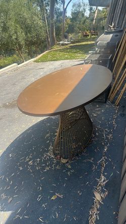 Oval Dining Table with Wire Pedestal Base