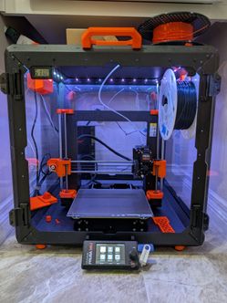 Prusa MK4 3D printer with enclosure and filament
