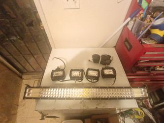 4' light bar with x4... 4" Baja lights with wiring harnes