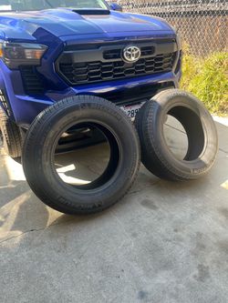 TWO MICHELIN TIRES DIFFERENT SIZED P265/60R18—P255/70R18.$35. EACH