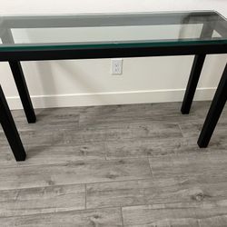 Black Metal Sofa table with glass top: The unit is 48” wide by 16” deep by 29 1/2” tall.