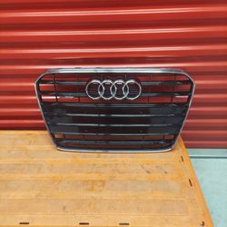 Genuine front radiator grille
for an Audi A5 