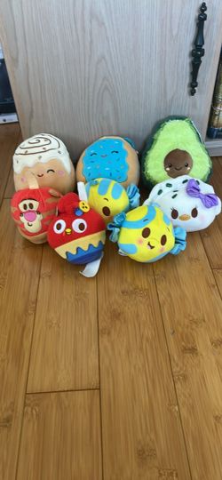 Assorted squishmallows and Disney plush collection
