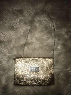 Small envelope size gold clutch