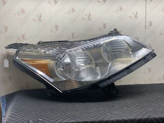 09-12 CHEVY TRAVERSE PASSENGER HEADLIGHT